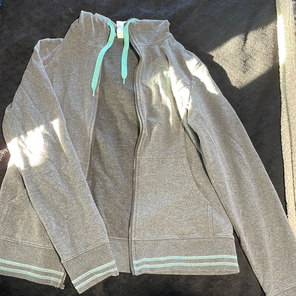 Grey and Teal North Face jacket Women’s size M/L